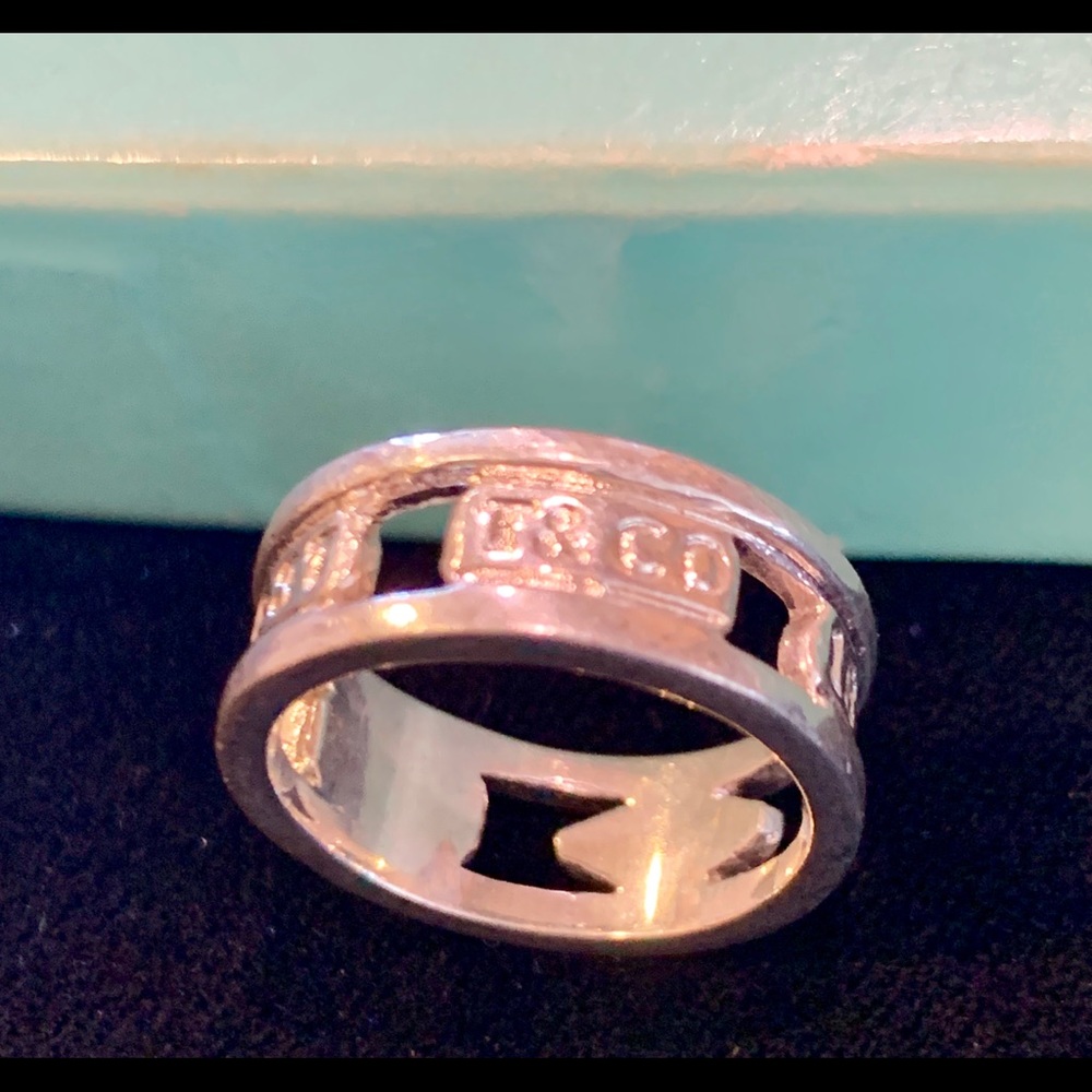 TIFFANY & CO. SS Band with cut outs